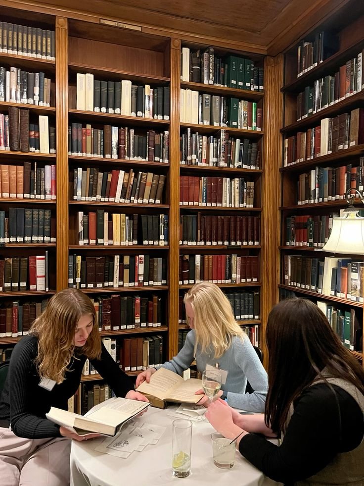 Student studying with a laptop in a university library